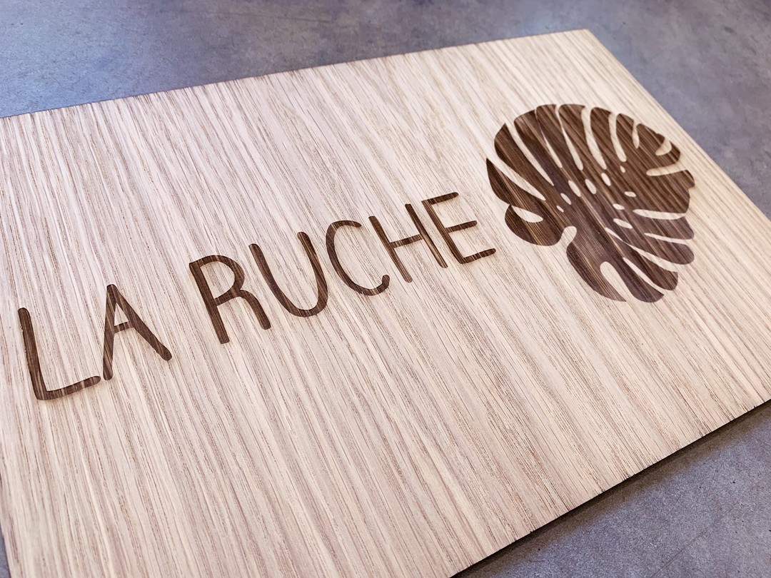 Panneaux signalétiques en bois pour les bureaux d'EXCO - CRAFT & CO